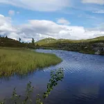 With Panoramic Views Over The Mountains *
