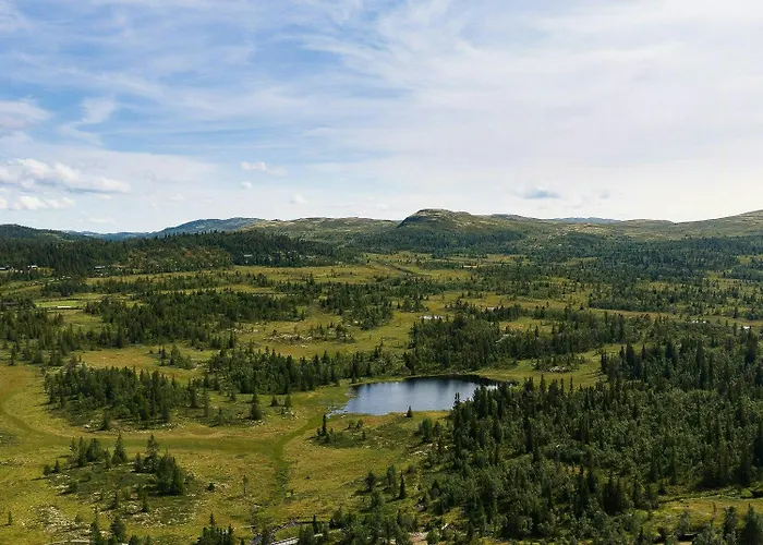 With Panoramic Views Over The Mountains